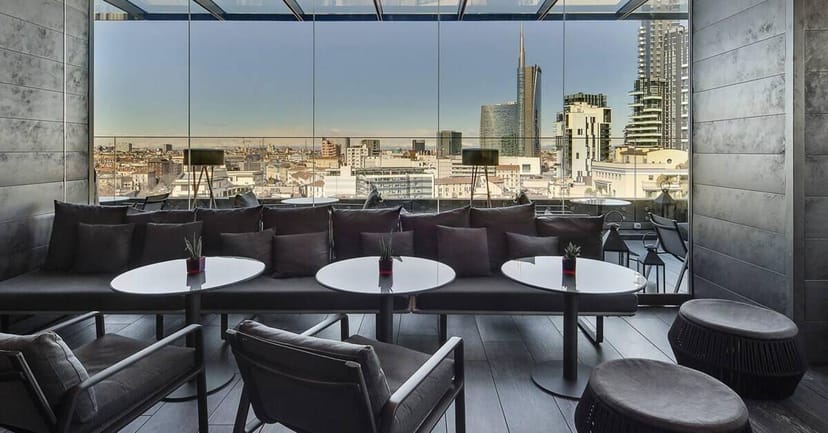 Luxury rooftop terrace with skyline view for premium cocktail receptions and VIP networking events.