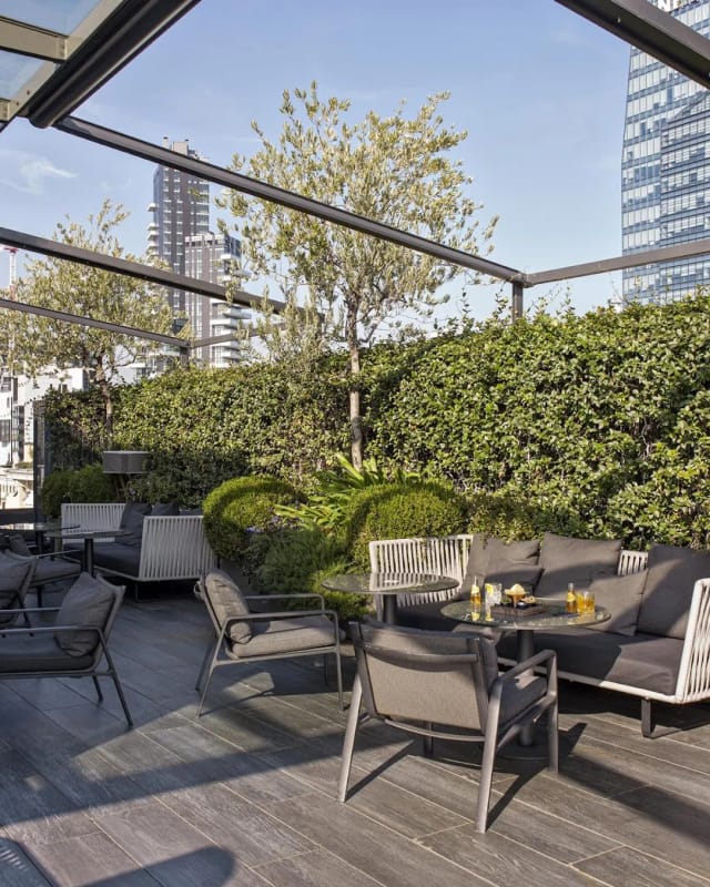 ME Milan Il Duca rooftop terrace for high-end networking and corporate cocktail events.