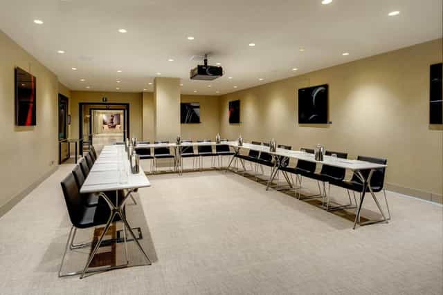 U-shaped boardroom at ME Milan Il Duca for corporate training or business meetings.