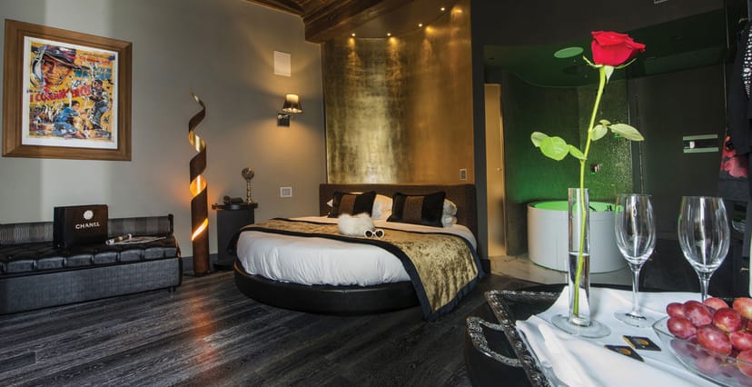 Luxury hotel suite in Torre Argentina Relais, elegant design for romantic getaways and VIP events.