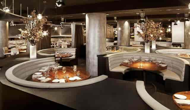 STK Milan circular booths for executive dining and corporate networking events.