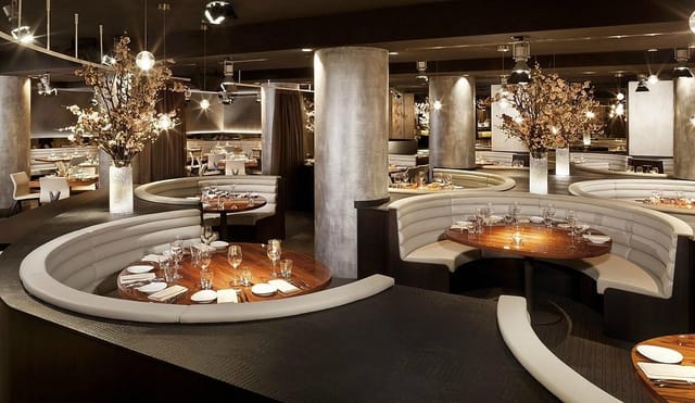 STK Milan circular booths for executive dining and corporate networking events.
