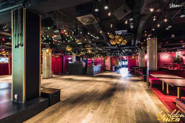 Versatile dance hall with banquette seating for corporate mixers and evening receptions.