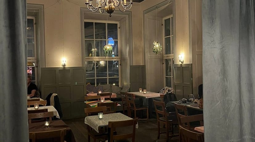 Grillska Huset banquet hall with cozy lighting for corporate dinners and upscale board meetings.