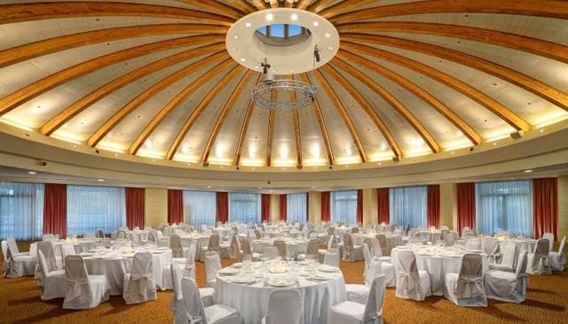 Circular banquet hall at Enne20 with domed ceiling for gala dinners and product launches.
