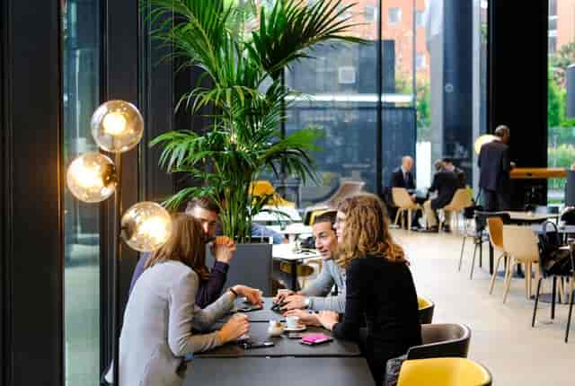Copernico Isola breakout space for professional networking and business meetings.