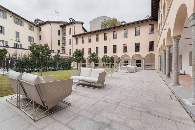Milano Room courtyard with lounge seating, ideal for corporate events and cocktail receptions.