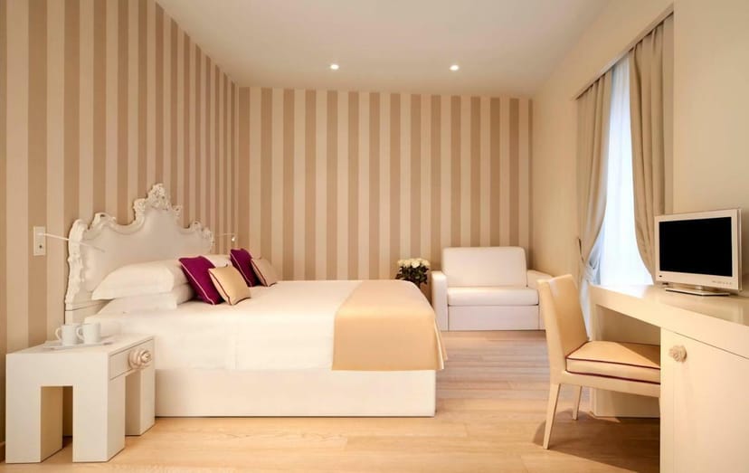 Luxury Duomo suite with classic decor, perfect for VIP accommodations and executive retreats.