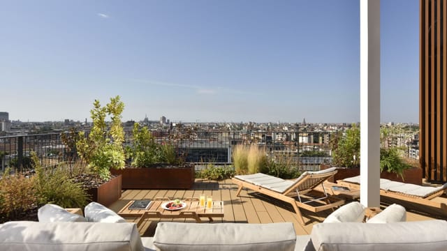 Milano Verticale rooftop terrace with lounge seating for VIP receptions and networking events.