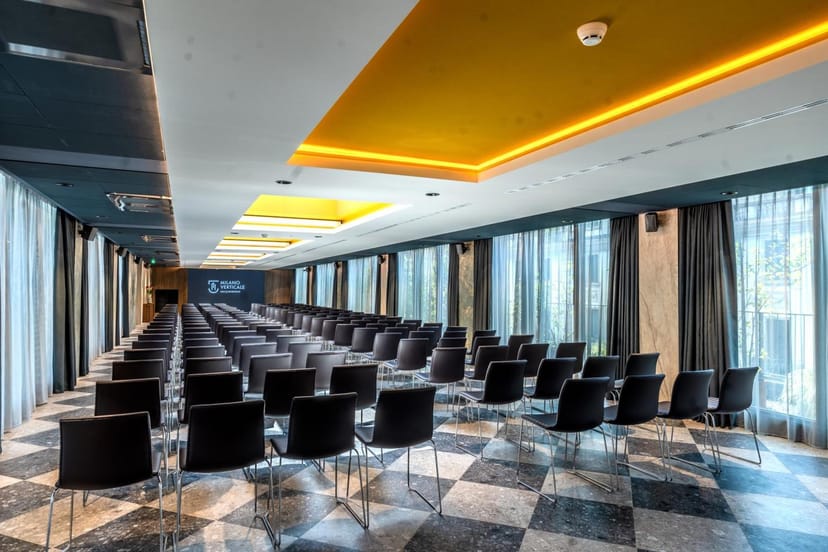 Theater-style corporate meeting room at Milano Verticale for business presentations or workshops.