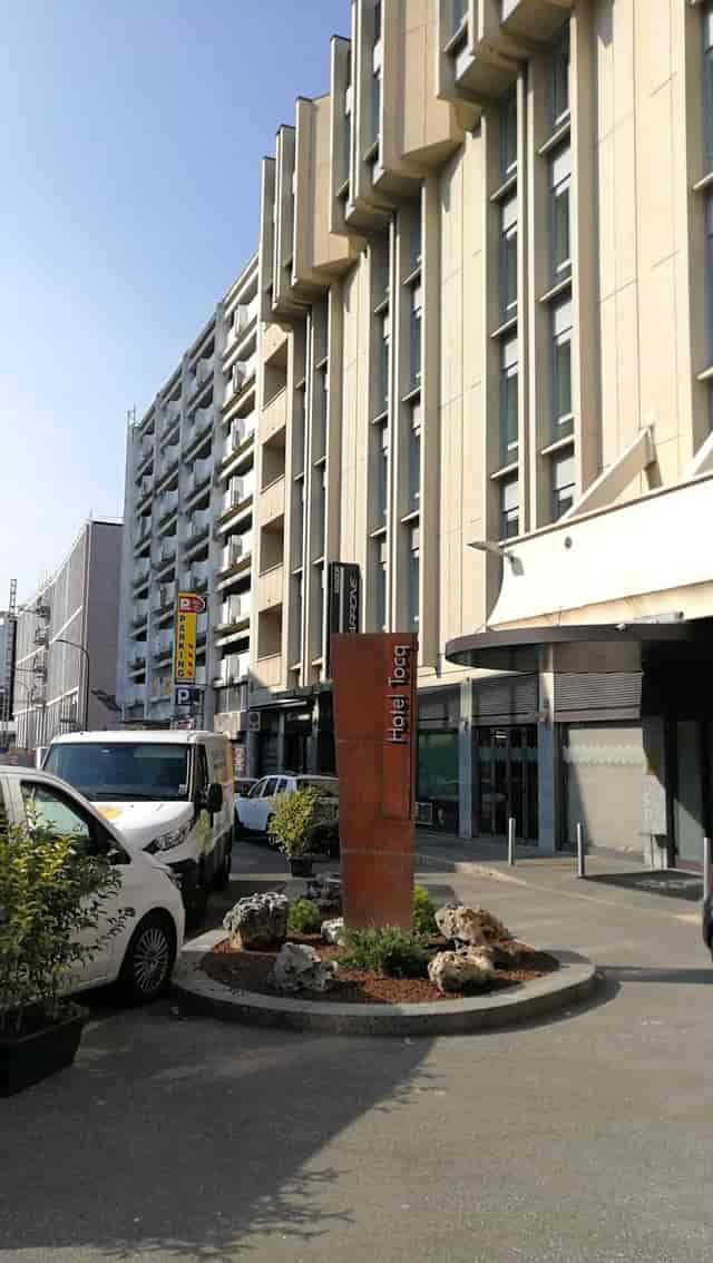 Hotel Tocq Corso Como exterior, functional urban terrace for satellite meetings and group blocks.