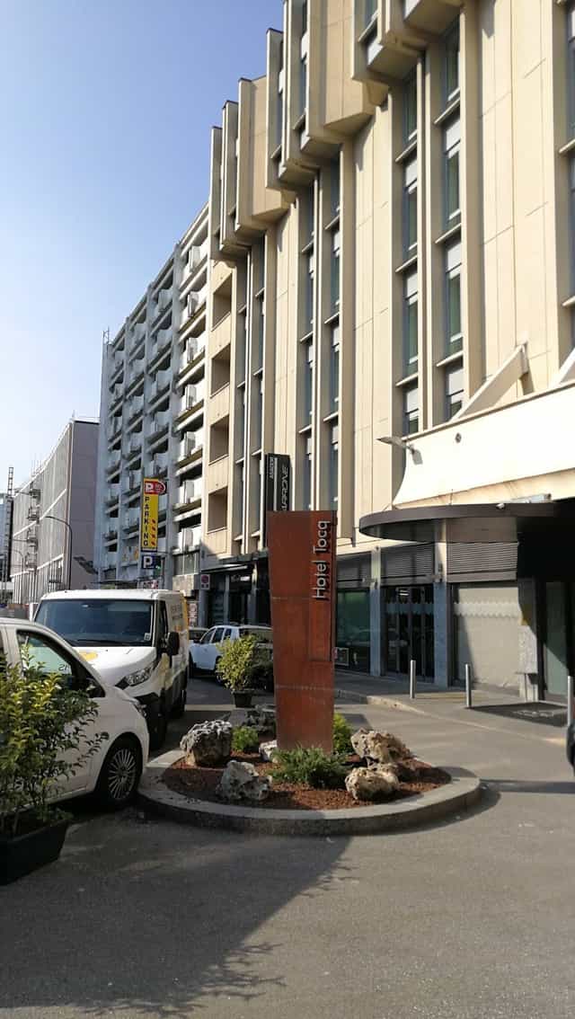 Hotel Tocq Corso Como exterior, functional urban terrace for satellite meetings and group blocks.