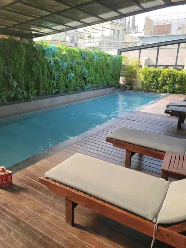 Private poolside breakout space at Champagnerie for executive retreats and wellness events.