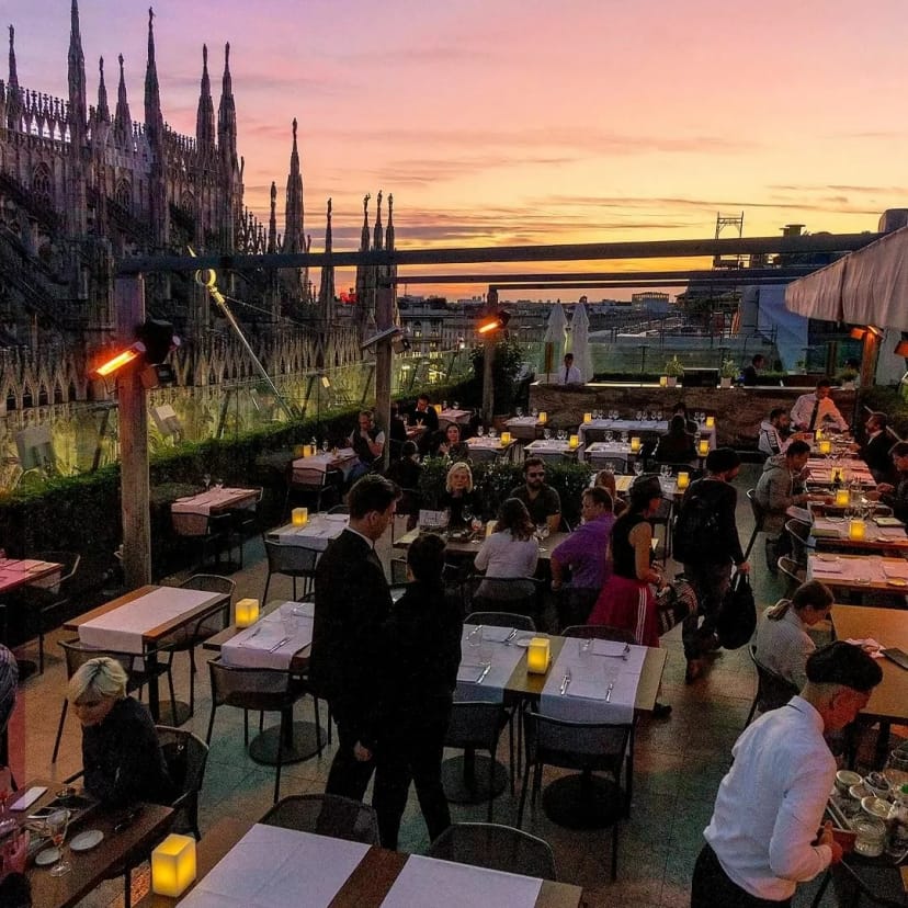Rooftop lounge in Milan with cathedral views for corporate dinners and VIP receptions.