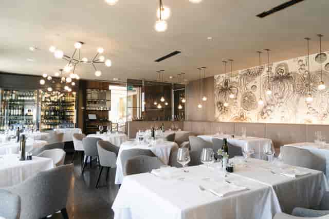 Terrazza12 rooftop lounge with formal dining, perfect for VIP dinners and corporate events.