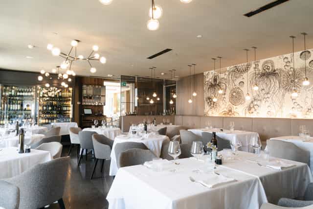 Terrazza12 rooftop lounge with formal dining, perfect for VIP dinners and corporate events.