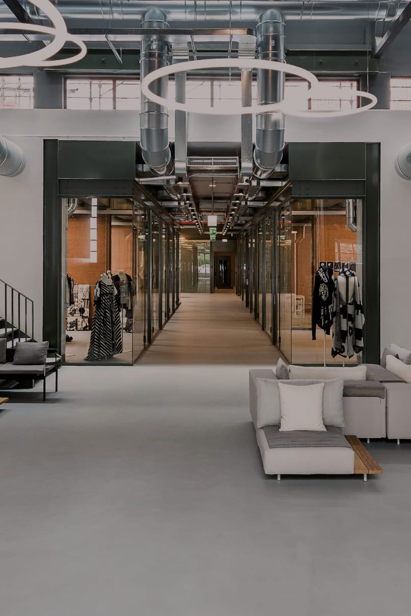 Industrial-chic Accademia lecture hall venue for fashion showcase and product launch.