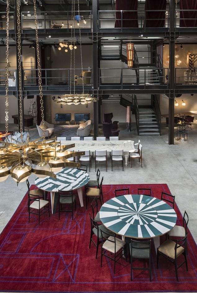 Industrial-chic MEET gallery venue with multi-level layout for boutique corporate events.