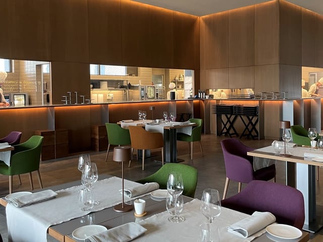 Glasshouses contemporary dining space for corporate banquet or VIP luncheon event.