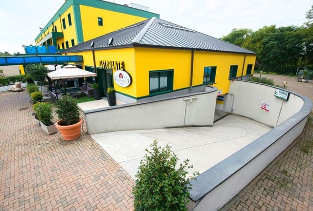Restaurant Sempione 320 hotel exterior with underground parking for corporate events or meetings.