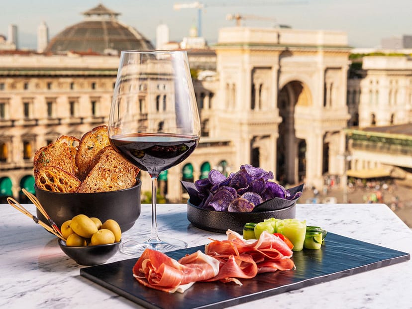 VIP cocktail reception at The Dome Restaurant, Milan rooftop venue for luxury corporate events.