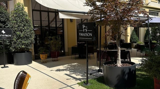 Luxury VMaison Hotel garden for intimate outdoor wedding reception or upscale networking event.