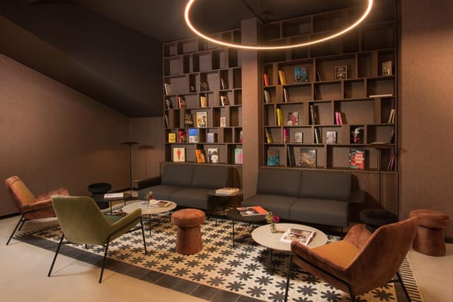Sophisticated NH Milano breakout room for networking and brainstorming events.