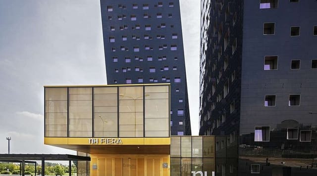 Modern NH Milano Fiera restaurant venue for corporate events and conferences.