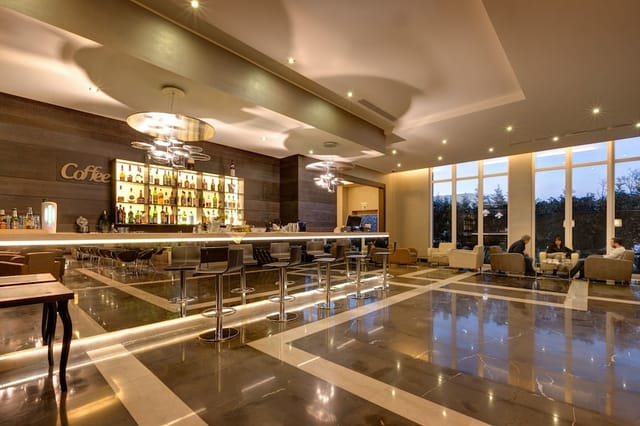 Upscale lounge at Klima Hotel Milano for corporate networking and evening reception events.