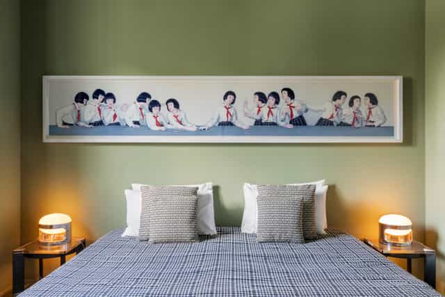 Boutique hotel room with statement art focal point for luxury event styling.