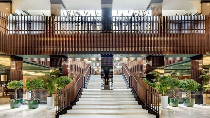 Grand staircase in Melià Hotel event space, perfect for gala arrival and brand activation.