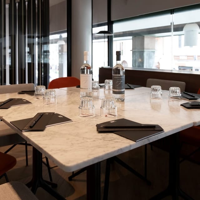 Upscale boardroom with marble table at Urban Hive Hotel for executive meetings and corporate events.