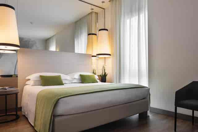 Modern Starhotels E.c.h.o. suite, upscale guest room for VIP accommodations and executive events.