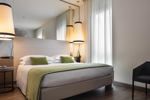Modern Starhotels E.c.h.o. suite, upscale guest room for VIP accommodations and executive events.