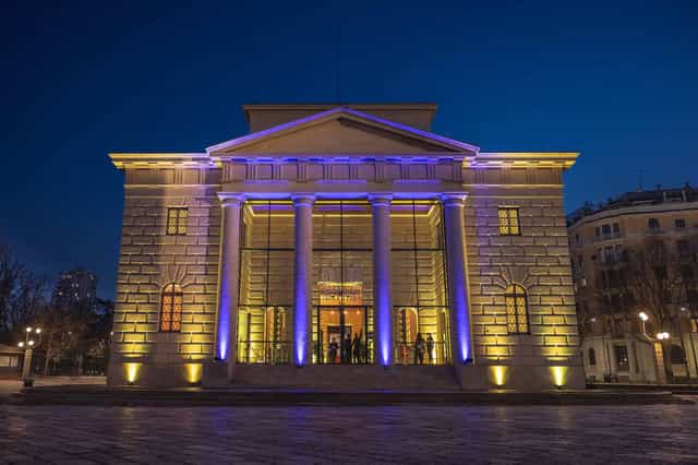 Neoclassical cafe with dramatic lighting for corporate events and gala venue hire.
