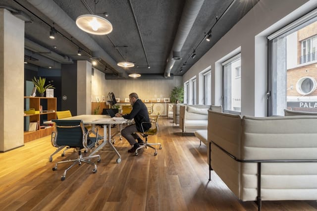 Modern meeting room at Spaces Porta Nuova with collaborative seating for professional events.
