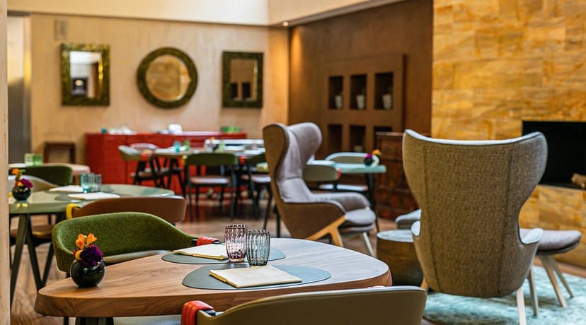 Sophia's Restaurant breakout space with lounge seating for networking and coffee events.