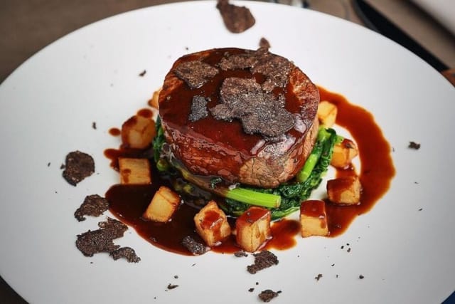 High-end plated entrée at PYT Milano for VIP gala dinner and executive event catering.