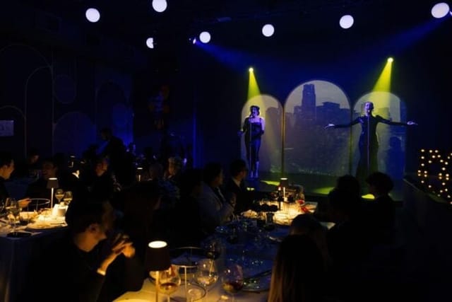 PYT Milano immersive dinner show with scenic projection lighting for exclusive event dining.