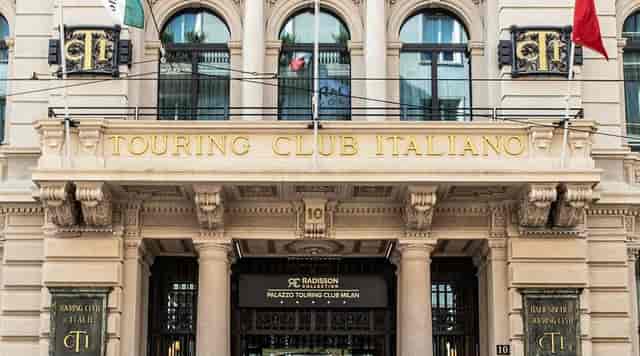 Grand historic entrance of Radisson Collection Milan for luxury corporate and gala events.