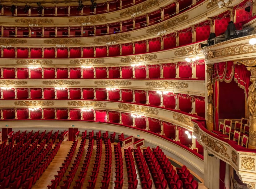 Teatro alla Scala historic theater with multi-tiered seating for gala and keynote events.