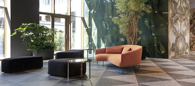 Modern reception at Urban Cube Milano, biophilic design for networking and VIP corporate events.