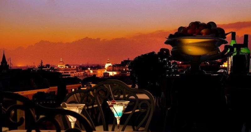 Rooftop garden venue at Marcella Royal Hotel with sunset view for VIP cocktail and dinner events.