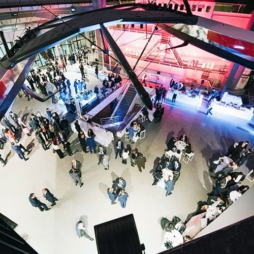 Industrial-chic event venue with lounge seating for corporate networking and experiential events.