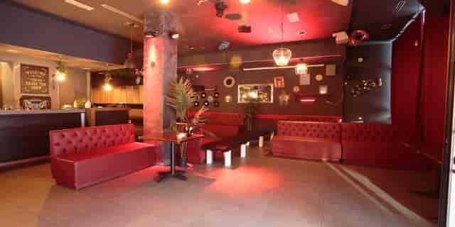 Club Milano banquet hall with perimeter seating for VIP networking and cocktail events.