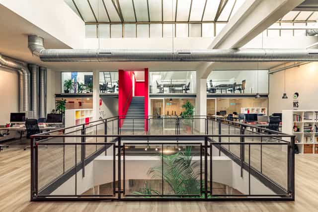 Industrial-chic business center venue for creative workshops and networking events.