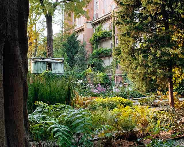 Enchanting private garden courtyard for intimate cocktail hour or boutique wedding venue.