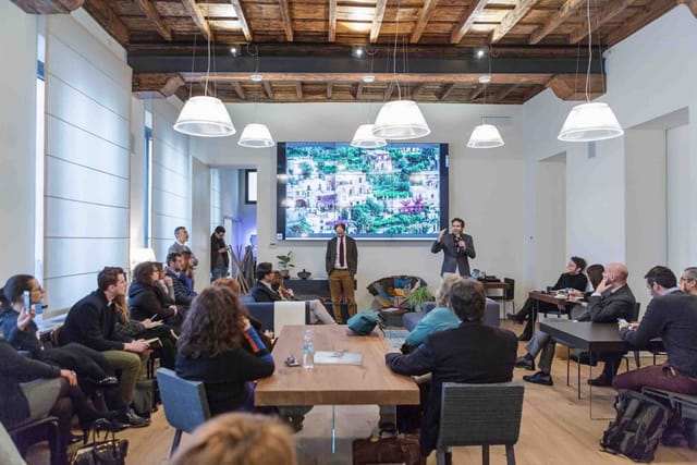 Rustic-modern breakout session at Cucina LAGO with wood beams for corporate events and meetings.