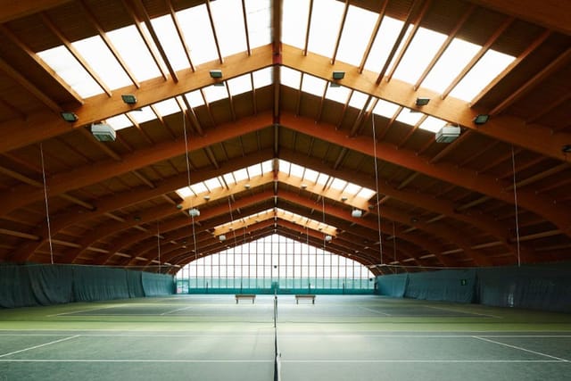 Aspria Harbour Club indoor pool: industrial event space for pop-ups and creative exhibitions.