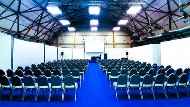 Classroom conference at Crowne Plaza Milan Linate, industrial event venue with pipe-and-drape.